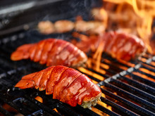 Grilling Lobster Over Hot Flame
