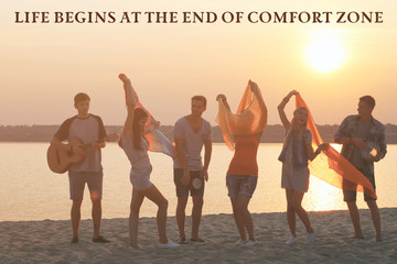 Comfort zone concept. Joyful friends having fun on the shore at sunset outdoors