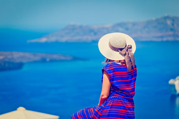 young woman on vacation in Santorini, Greece