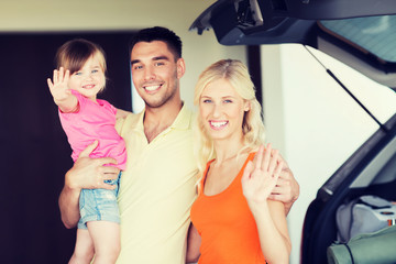 Canvas Print - happy family with hatchback car at home parking