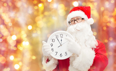 Sticker - man in costume of santa claus with clock