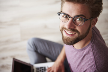 Wall Mural - Stylish man using modern laptop