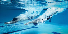 Swimmer Jump From Platform Jumping A Swimming Pool.Underwater Ph