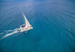 Aerial view of catamaran sailling in ocean