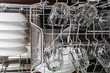© PixieMe - Dishes in a modern dishwasher machine