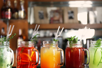 Poster - Different cocktails on table in cafe