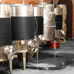 Poster - Stainless steel reservoirs for wine on factory