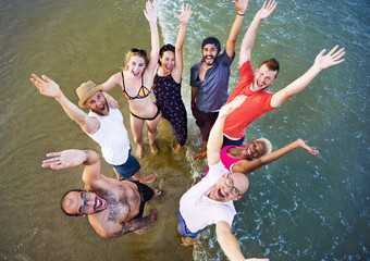 Wall Mural - Young People Standing Near Sea Concept