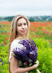 Poster - girl with bouquet of lupine flowers