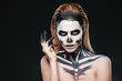 © Drobot Dean - Portrait of young woman with scared halloween makeup