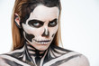 © Drobot Dean - Woman with terrifying skeleton makeup