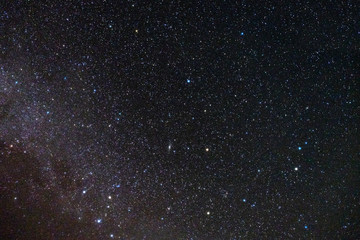 stars fill the sky in the dark
