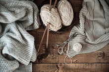 Ball Of Yarn And Knitting At Home