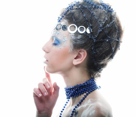 portrait of winter queen with artistic make-up. Isolated on whit