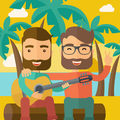 Canvas Print - Two men playing a guitar at the beach