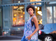 Portrait of fashionable black woman on city street