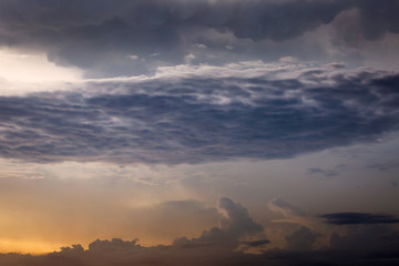 Wall Mural - Rain cloud in sunset
