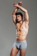 © Drobot Dean - Attractive brutal man in underwear posing and looking at camera