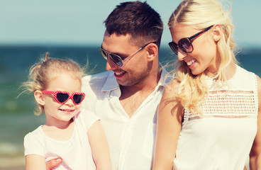 Sticker - happy family in sunglasses on summer beach