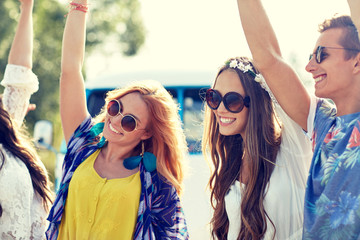 Sticker - happy young hippie friends dancing outdoors