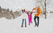 © Syda Productions - happy family in winter clothes walking outdoors