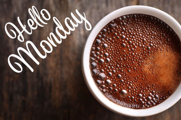 Wall Mural - Text HELLO MONDAY and cup of aromatic coffee, closeup