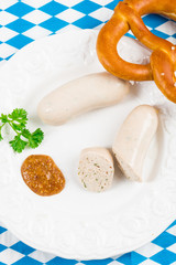 Wall Mural - Bavarian sausage with pretzel, sweet mustard and beer