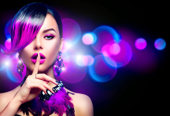 Poster - Sexy beauty fashion woman with purple dyed fringe hairstyle isolated on black background