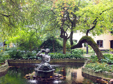 Park With Pond And Statue Fountain Off Shopping Street Drottning
