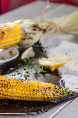 Poster - grilled corn on with lemon, herbs and spices