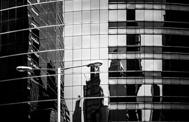 windows of business building with B&W color