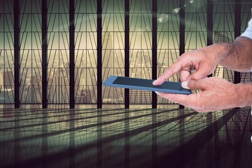 Poster - Man holding and touching the screen of digital tablet