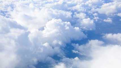 Wall Mural - clouds and blue sky from the plane