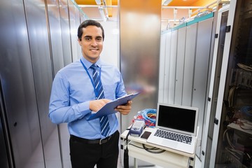 Aufkleber - Portrait of technician holding clipboard