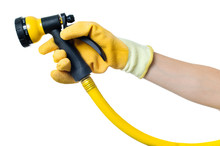 Female Gardener Woman's Arm And Gloved Hand Holding Yellow Garden Hose And Sprayer Isolated On White Background