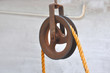Iron pulley with rope.