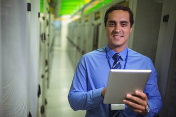 Aufkleber - Portrait of technician using digital tablet in hallway