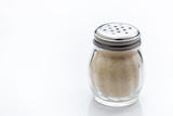 Fototapeta Perspektywa 3d - Shaker jar with Parmesan cheese on white background.