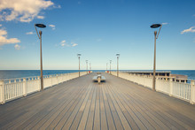 Symmetrical Wooden Pier In Kolobrzeg With Vintage Effect