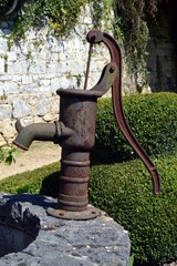 Old water pump in metal.