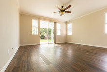 Room Of House With Finished Wood Floors.