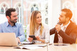 © Production Perig - Group of business people working together at the office