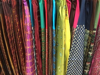 Colorful Thai silk fabric on hanger