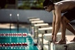© torwaiphoto - swimmer swimming competition pool.starting block in a swimming p