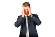 © Anton Gvozdikov - Young businessman in despair clutched his head. Crisis concept.