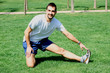 © Miroslav110 - Man at the park doing stretching exercises