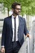© sanneberg - Thoughtful businessman looking away