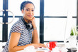 © Sergey Nivens - Portrait of smiling afro-american office worker in offfice