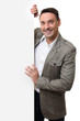 © spaxiax - fashionable casual handsome man holding blank poster