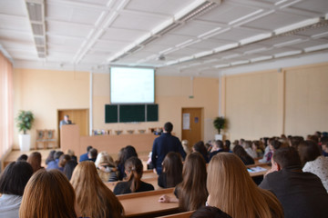 students at the lecture, selective focus on the near term